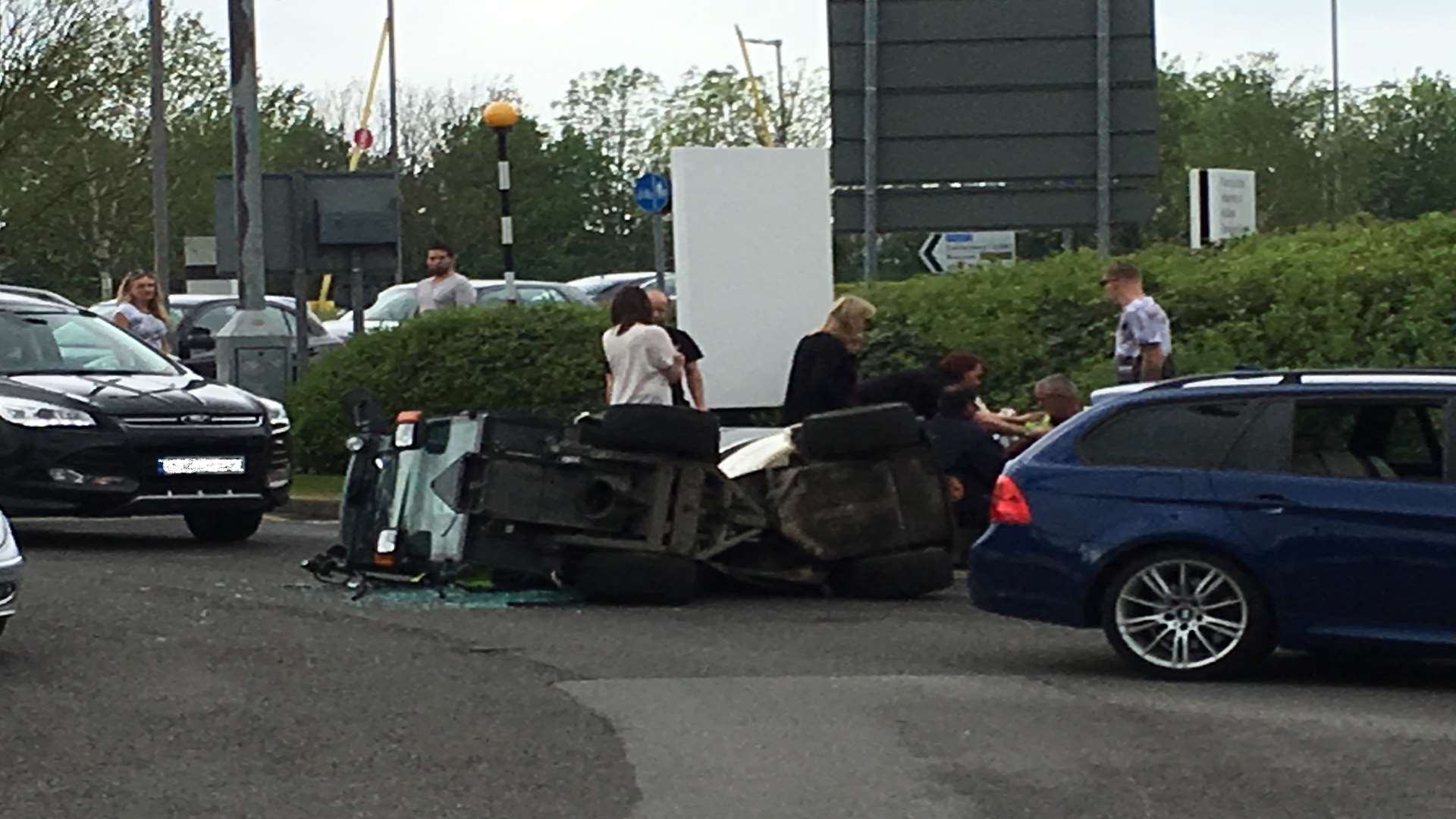 The upturned roadsweeper outside the Designer Outlet in Kimberley Way