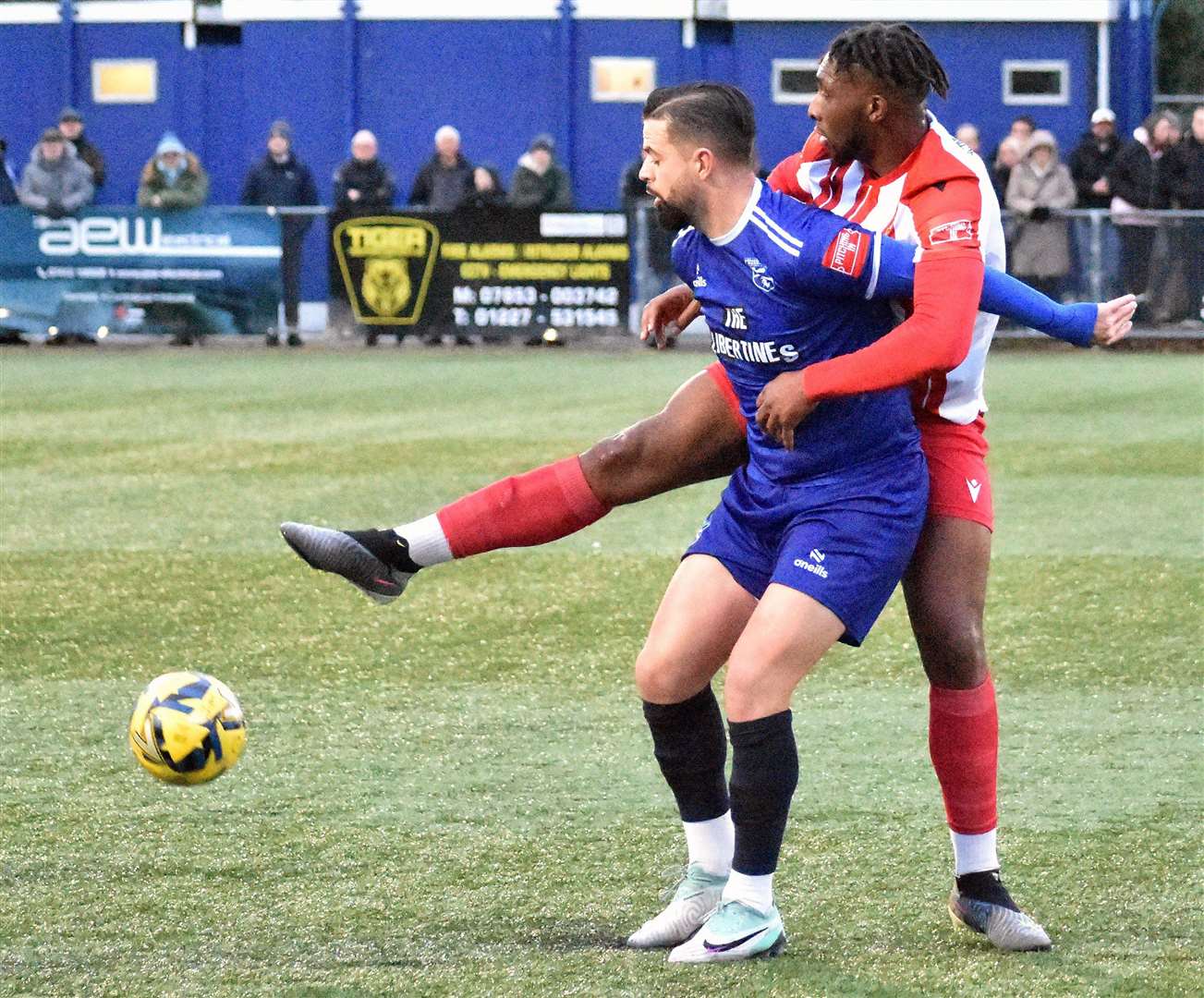 Ben Greenhalgh battles for the ball with a Folkestone player in midfield during their 2-0 Isthmian Premier loss to Invicta on New Year’s Day. Picture: Randolph File