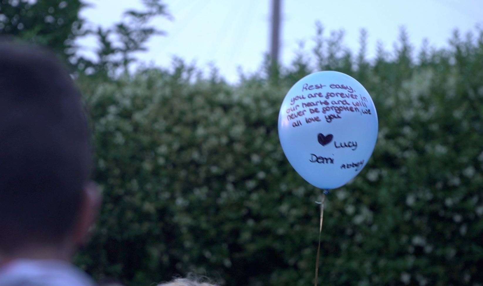 A message written on one of the balloons