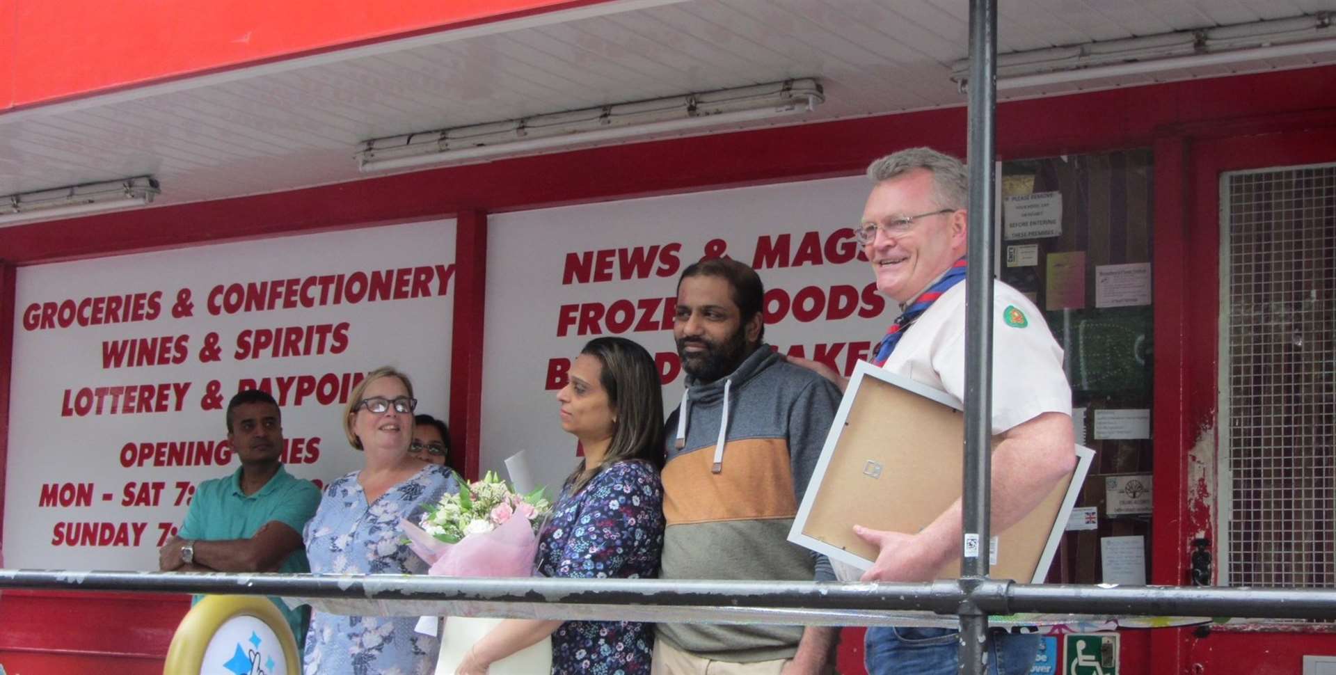 Cllr Sarah Hudson presented them with a £400 voucher for John Lewis to spend on their new home