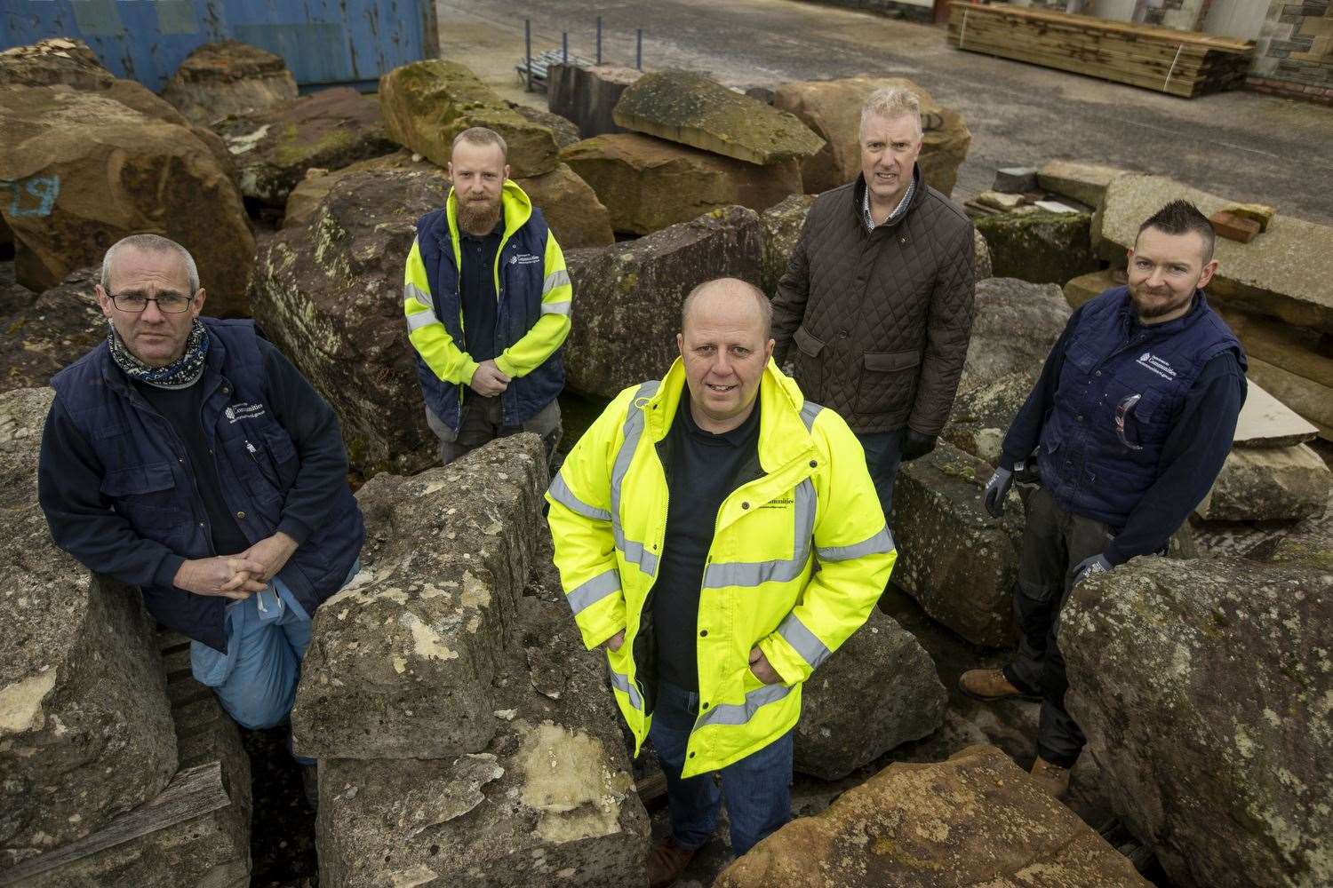 (from left) Heritage brick worker Louis Emmett, banker mason Stephen Hamilton, Heritage Skills Centre manager Darren Sharratt, head of State Care Operations Philip O’Neill and conservation joiner David McFerran (Liam McBurney/PA)