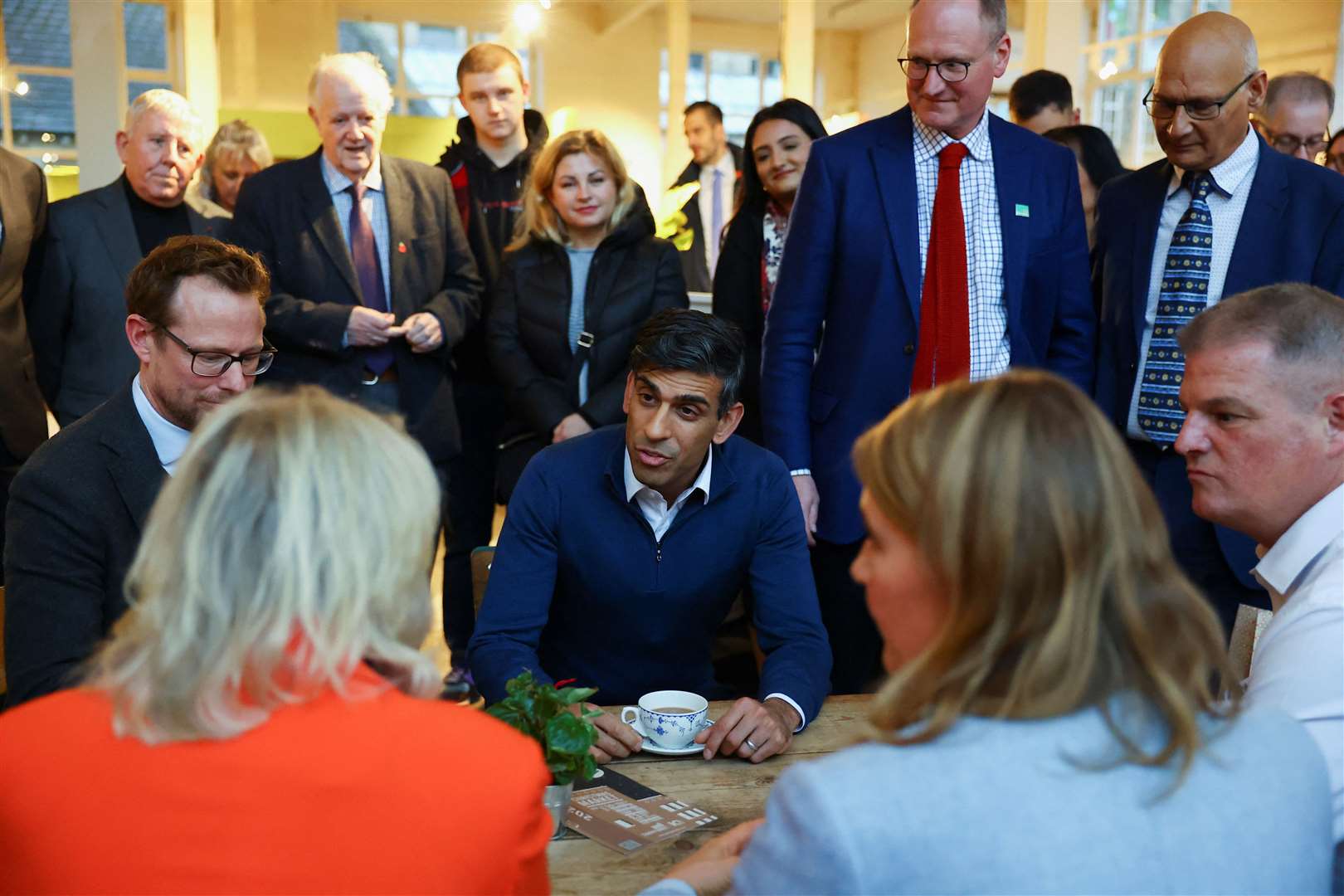 Rishi Sunak meeting small business owners in West Yorkshire (Molly Darlington/PA)