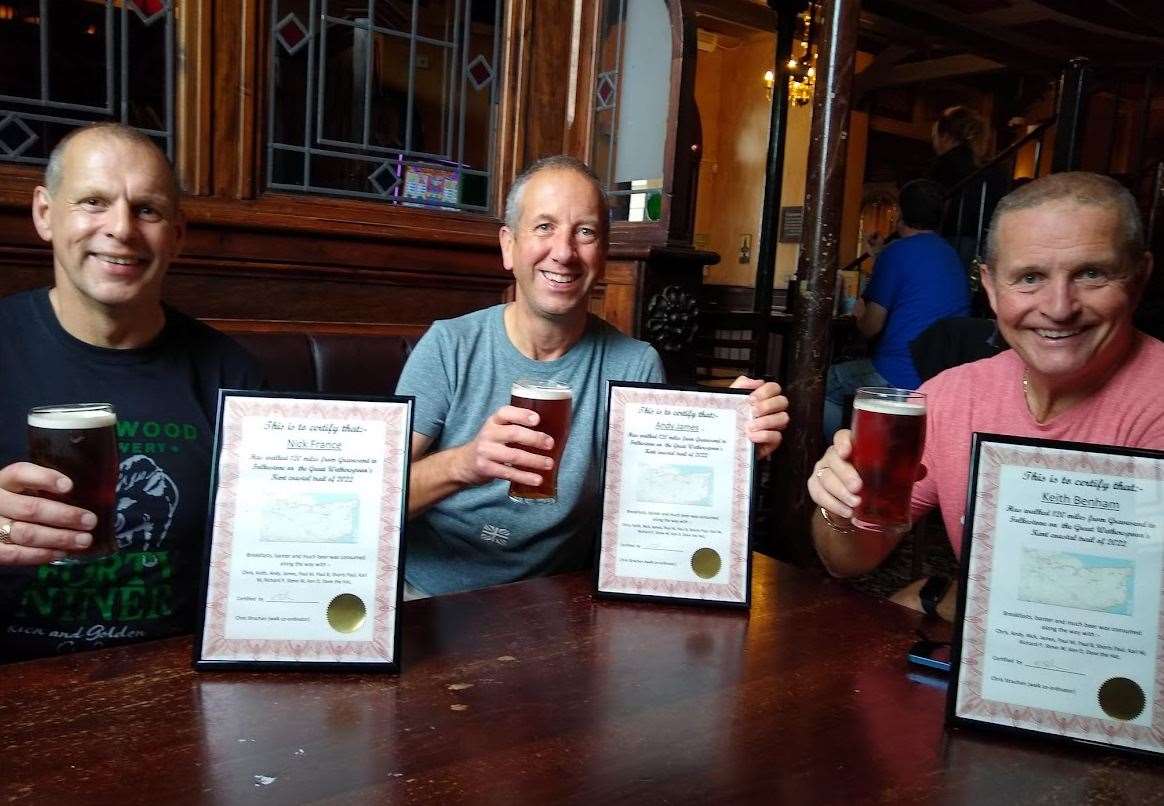 From Left to right: Nick France, Andy James and Keith Benham were gifted certificates by Chris after completing the original 120-mile challenge to Folkestone