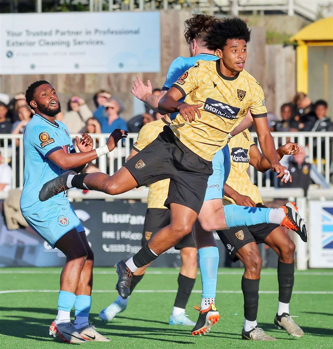 Maidstone midfielder Tayt Trusty gets stuck in against Slough last weekend. Picture: Helen Cooper