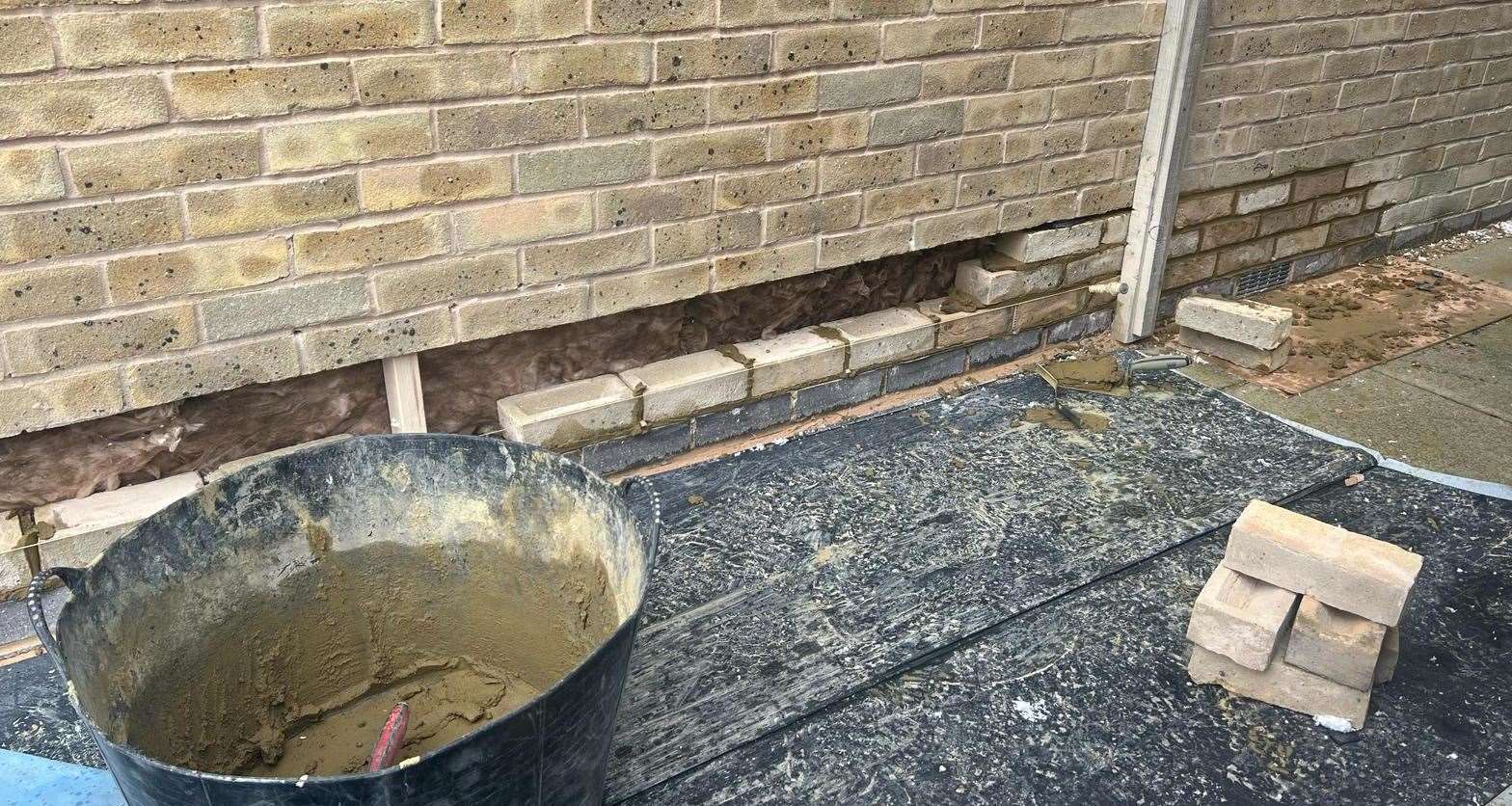 Builders had to remove three layers of bricks at the property