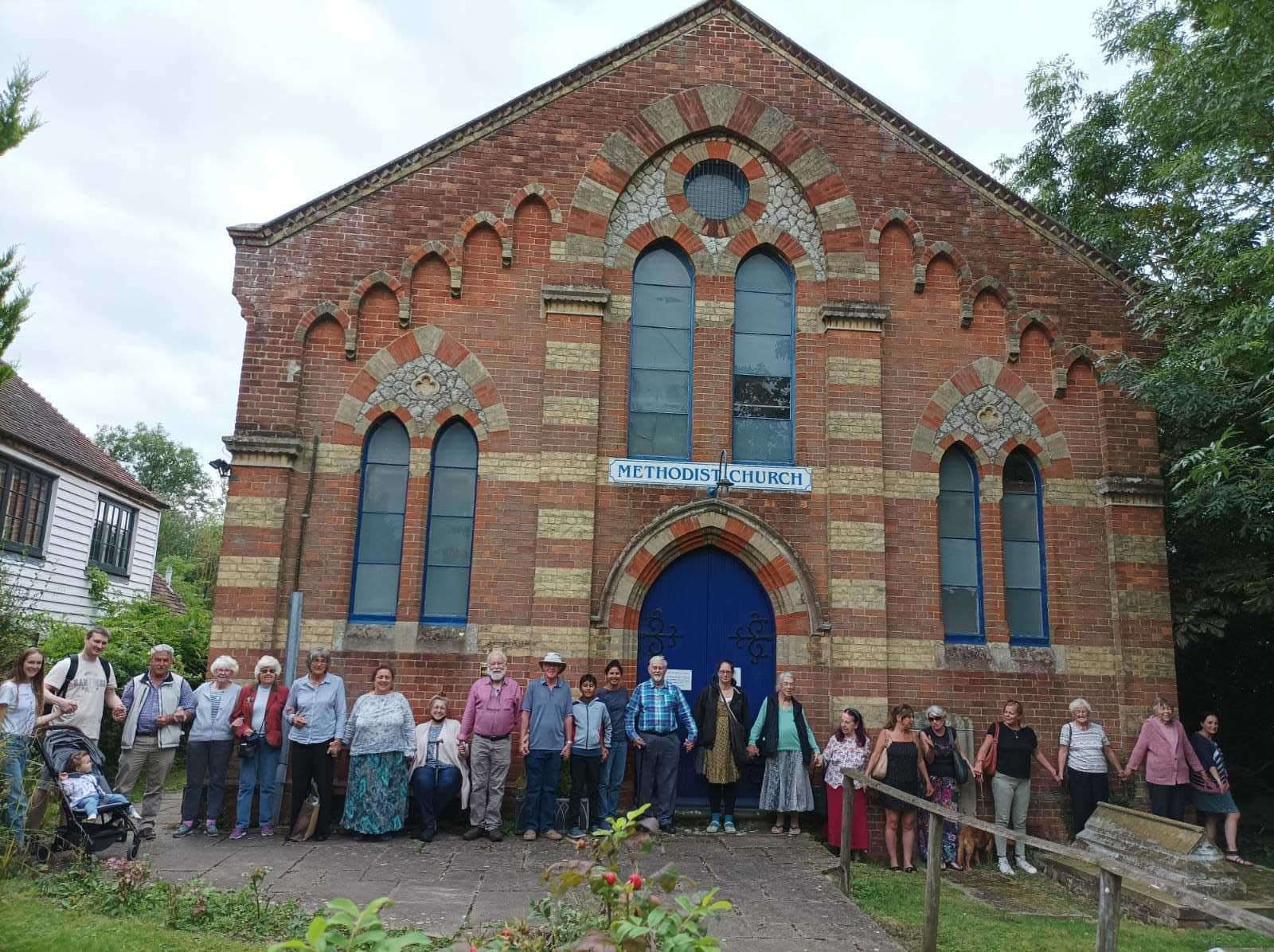 Supporters form a ring around Headcorn Methodist Church