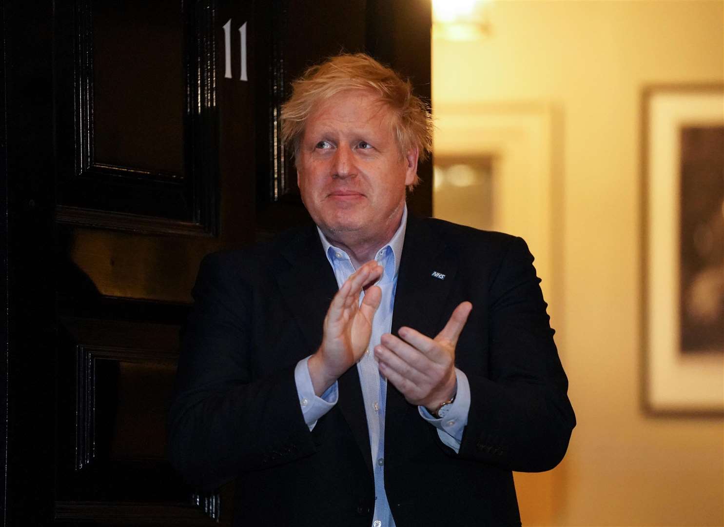 Prime Minister Boris Johnson clapping outside 11 Downing Street in London to salute local heroes last Thursday (Pippa Fowles/Crown Copyright/10 Downing Street/PA)