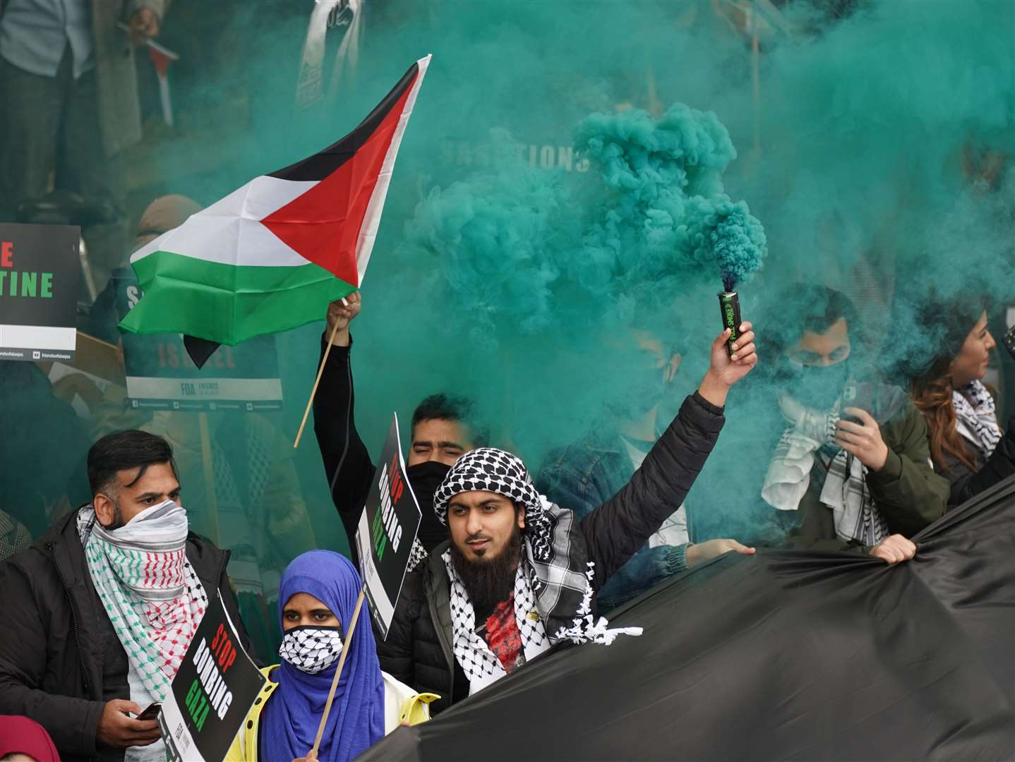 Protesters let off coloured smoke (Yui Mok/PA)