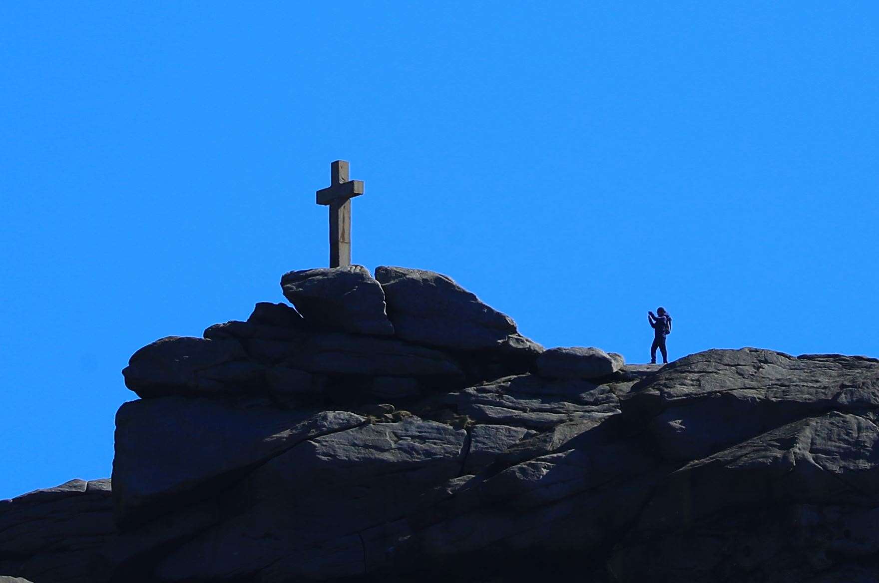 Blue skies around the Rylstone Cross near Skipton in North Yorkshire (Danny Lawson/PA)