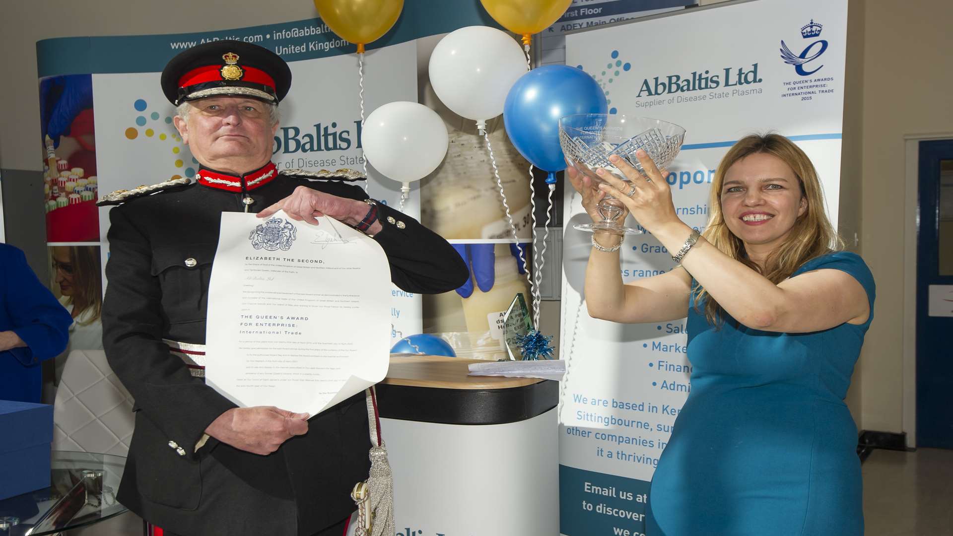 The Lord Lieutenant of Kent, the Viscount De L'Isle, presents a Queen's Award to AbBaltis managing director Giedre Brandao