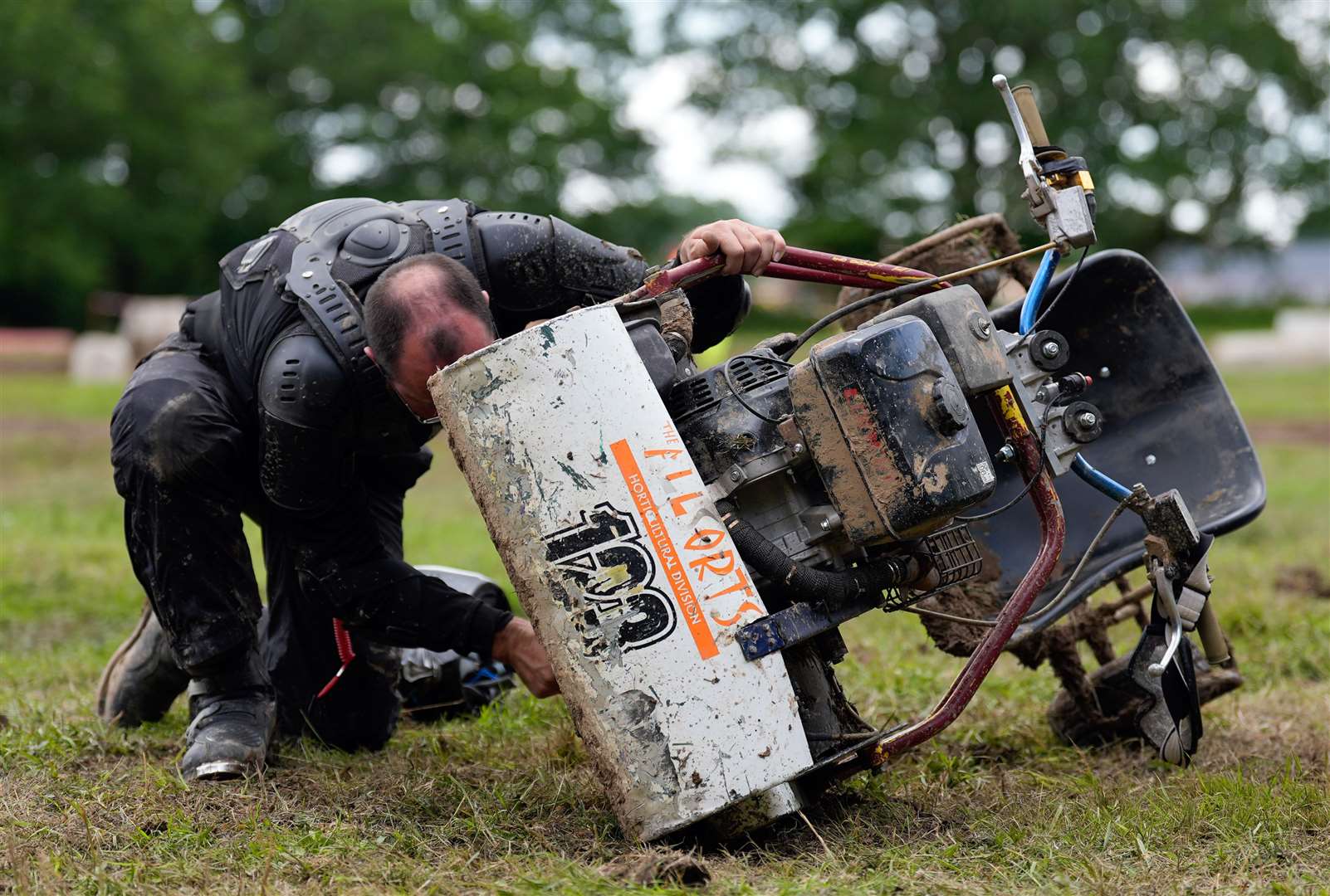 The event is held by the British Lawn Mower Racing Association at Pondfield Farm, Alford, Surrey (Andrew Matthews/PA)