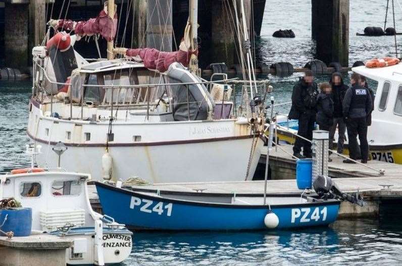 Police board yacht at Newlyn Harbour, Cornwall. Picture: Greg Martin