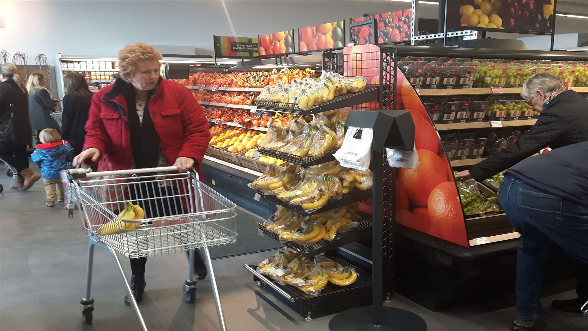 Shoppers began to fill their trolleys.