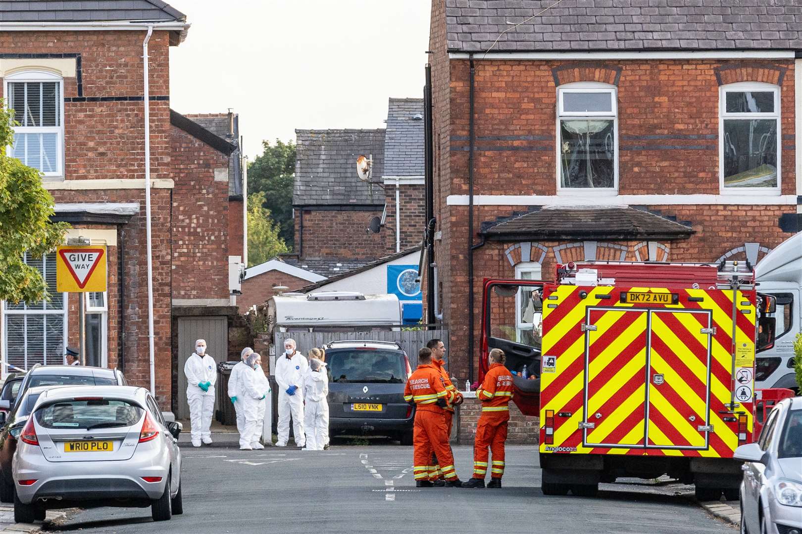 Emergency services near the scene of the knife attack in Hart Street, Southport (James Speakman PA)