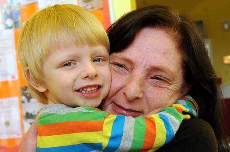 Proud mum Sue Tarsey gives her hero son Charlie a hug