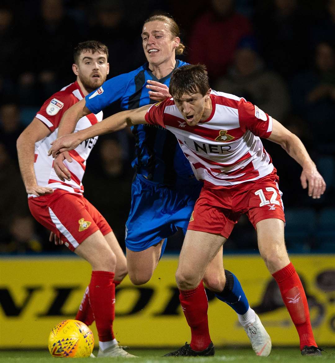 Tom Eaves in the thick of the action Picture: Ady Kerry