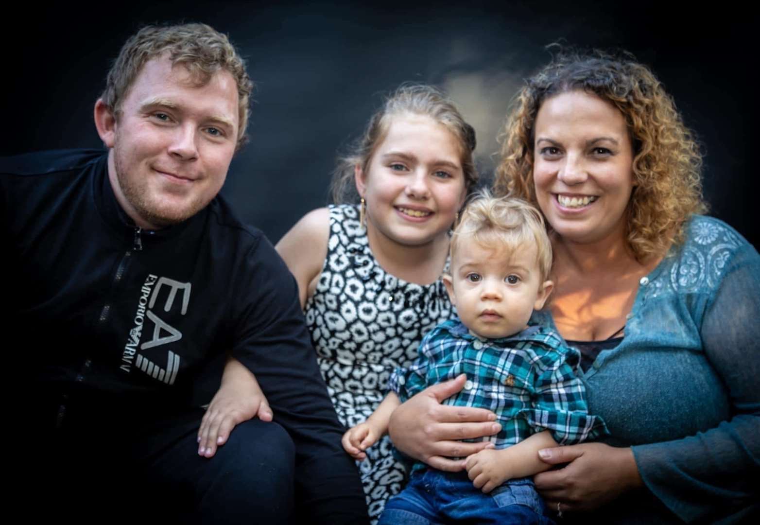 Mr Oakley with fiance Emma and children Rupert and Evelyn