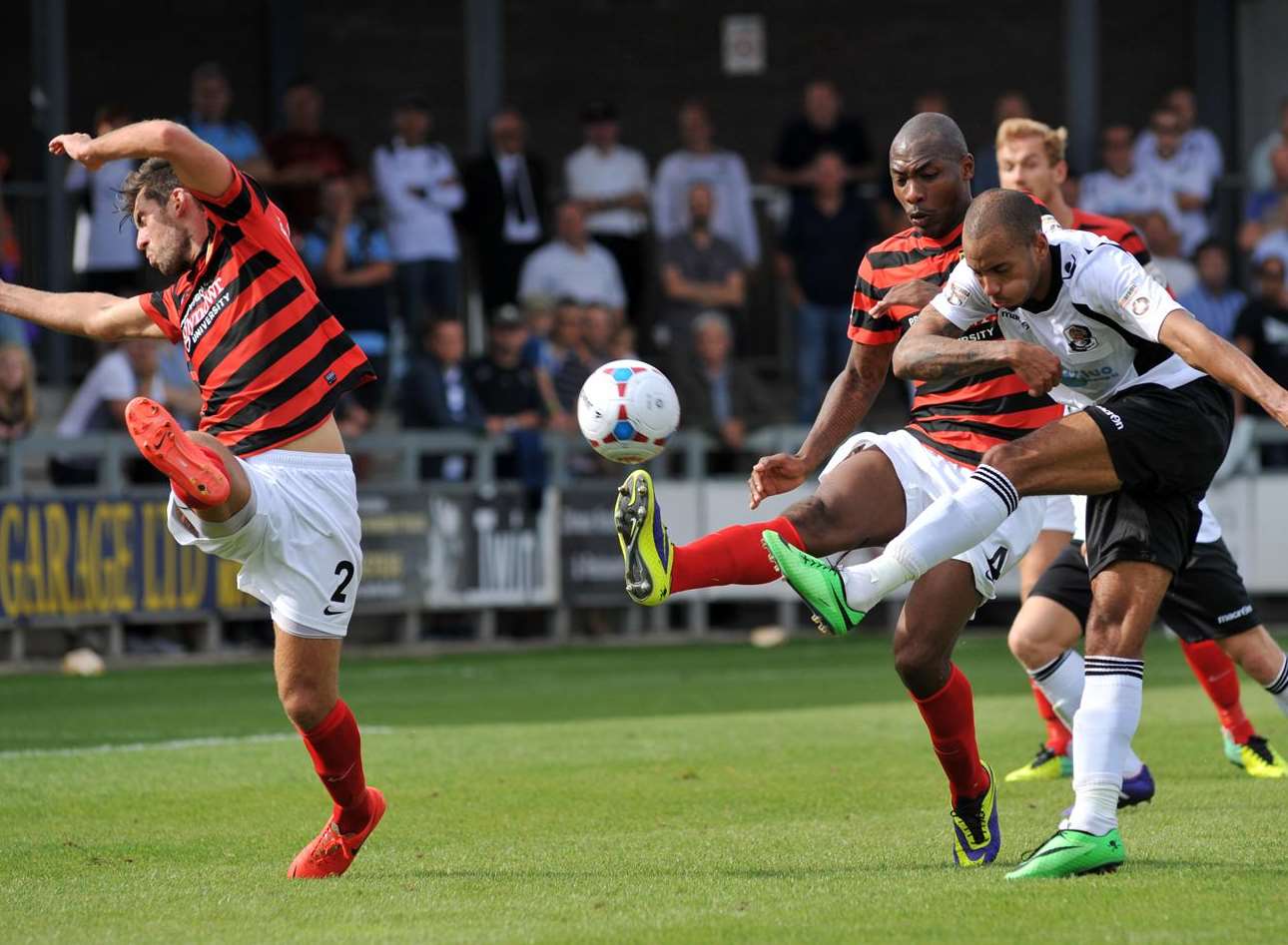 Debutant Luke Daley gets a shot away despite the attentions of Manny Smith Picture: Richard Eaton