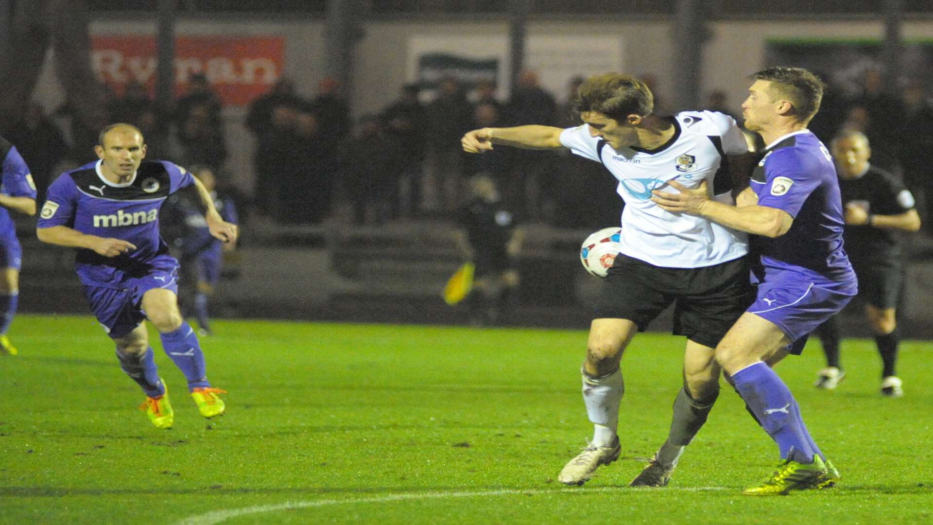 Tom Bradbrook battles for possession in midfield Picture: Steve Crispe