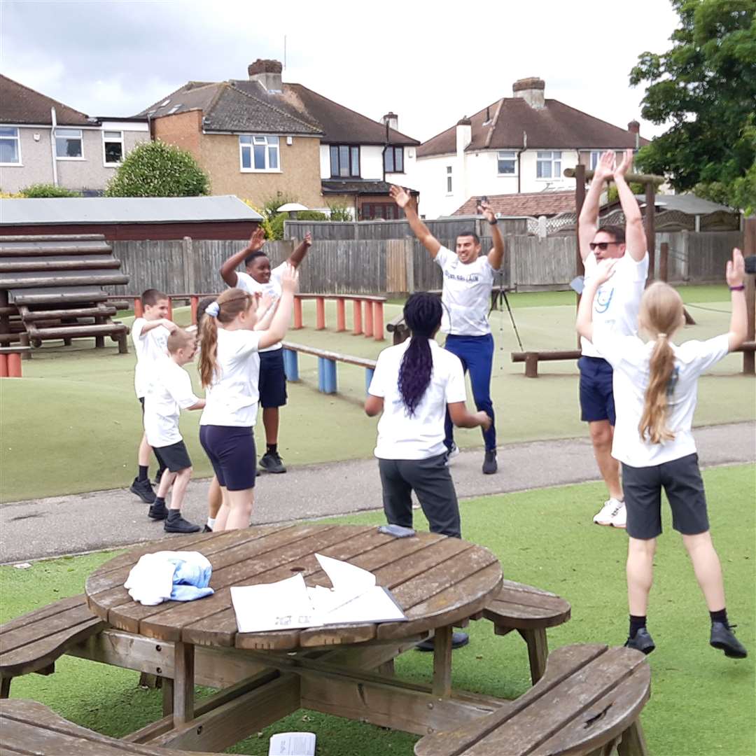 Adam Gemili took part in a series of sport and exercise drills with the children. Photo: Sean Delaney
