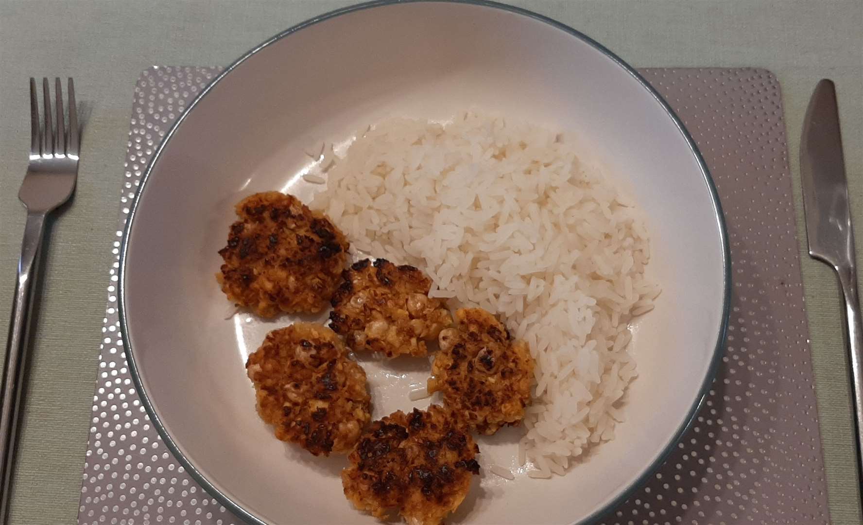 Falafel and rice. Really nice but I would have given anything to dip them in ketchup