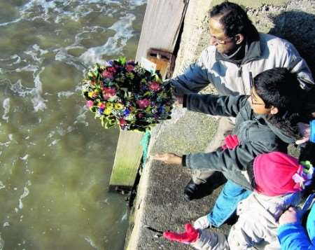 Wreath-laying ceremony at Margate harbour by members of charity KASTDA