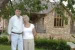 The Roles outside their bungalow which faces demolition