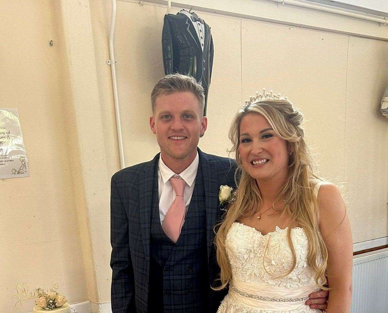 Amy Louise Barnes and Rhys Pryor saved more than £16,000 on their wedding by bagging second-hand outfits and buying Buck's fizz from Aldi. Picture: SWNS