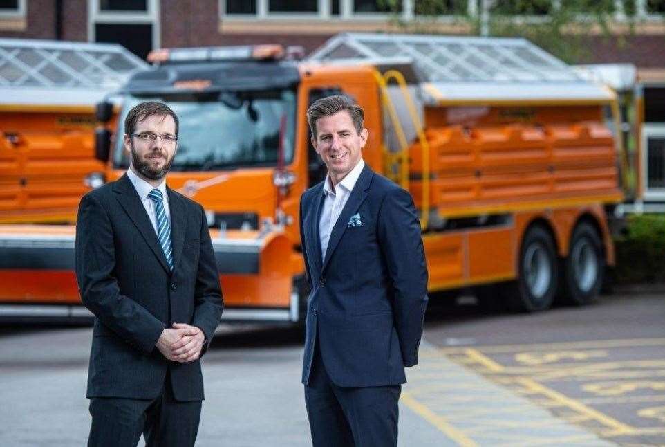 Duncan Smith, acting executive director of operations at National Highways receives the keys of new state-of-the-art Volvo gritter lorries from Stephen McKeown, managing director of Romaquip. Picture: National Highways