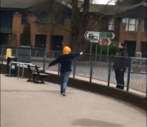 The man points the knife at a member of the public. Picture: Max Marwood (6248699)