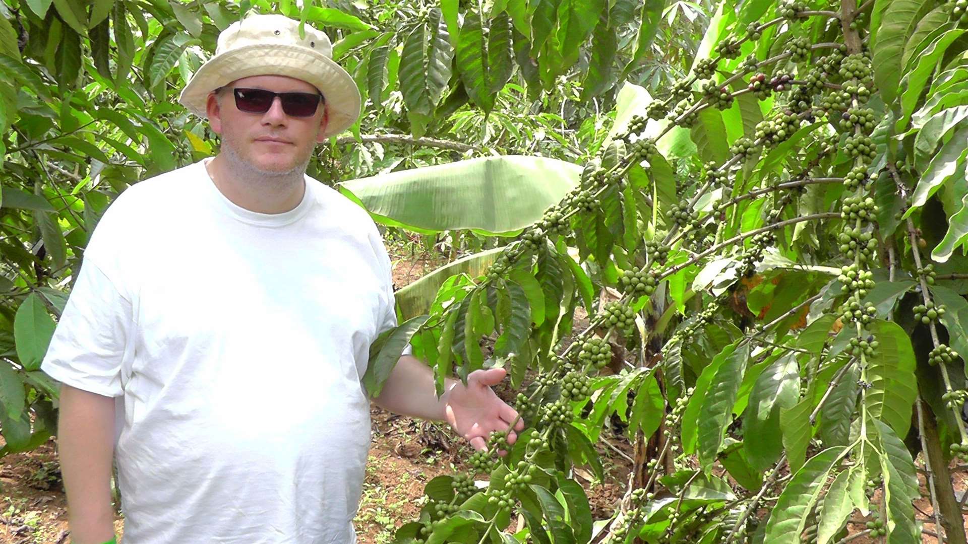 HatHats founder Louis Hurst at the coffee bean plantation in Uganda