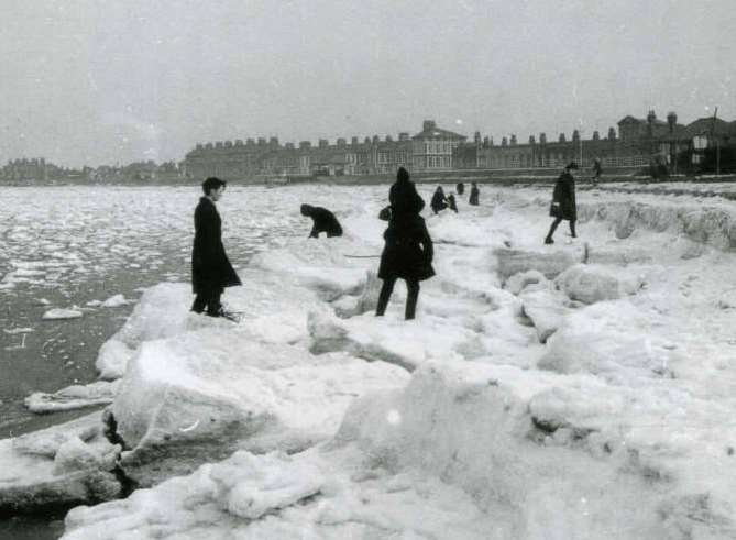 Children playing on the frozen sea at Sheerness, Sheppey, in 1963. Picture: Libby Tucker