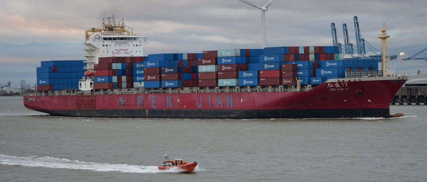 Gravesend RNLI alongside a container ship. Picture: Jason Arthur