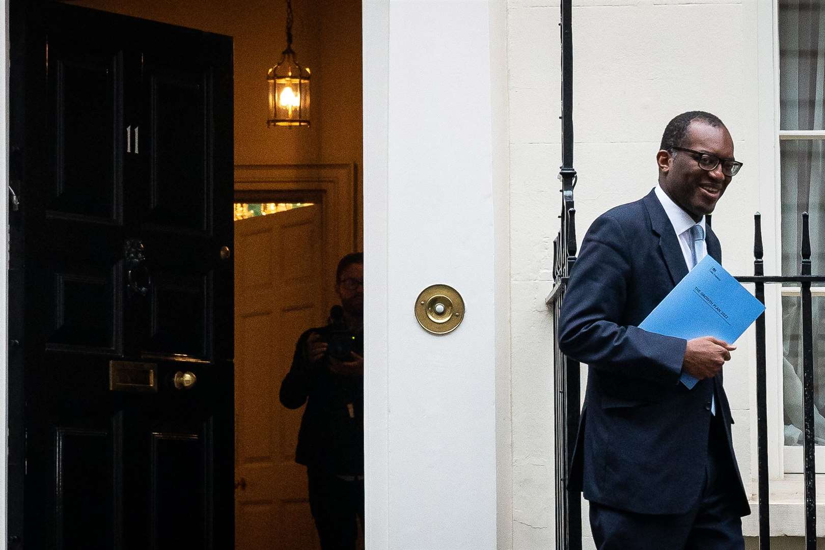 Chancellor of the Exchequer Kwasi Kwarteng leaves 11 Downing Street to make his way to the Treasury Department to deliver his mini-budget (Aaron Chown/PA)