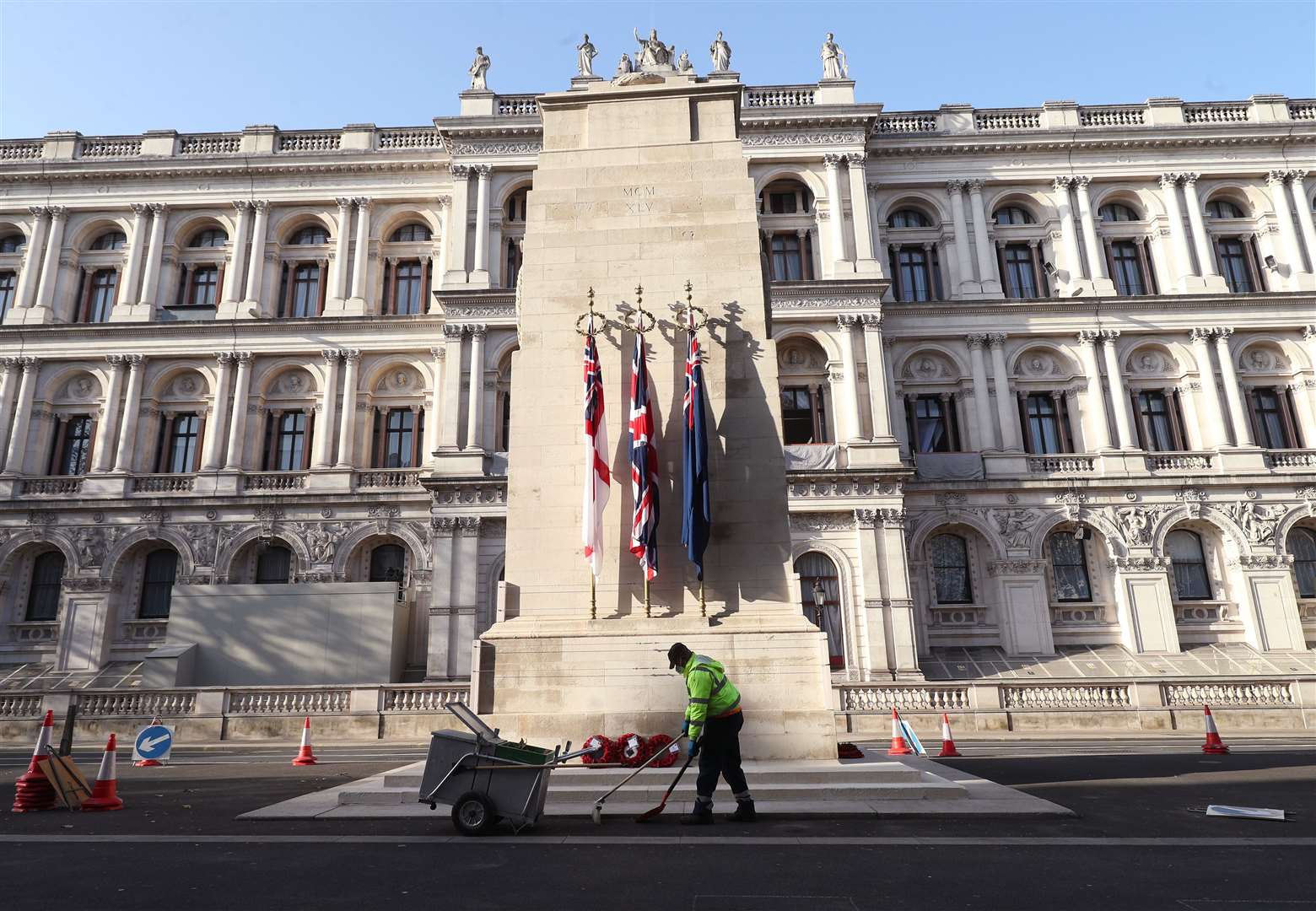 Cleaners at the Cenotaph in London as preparations are made ahead of Remembrance Sunday (Yui Mok/PA)