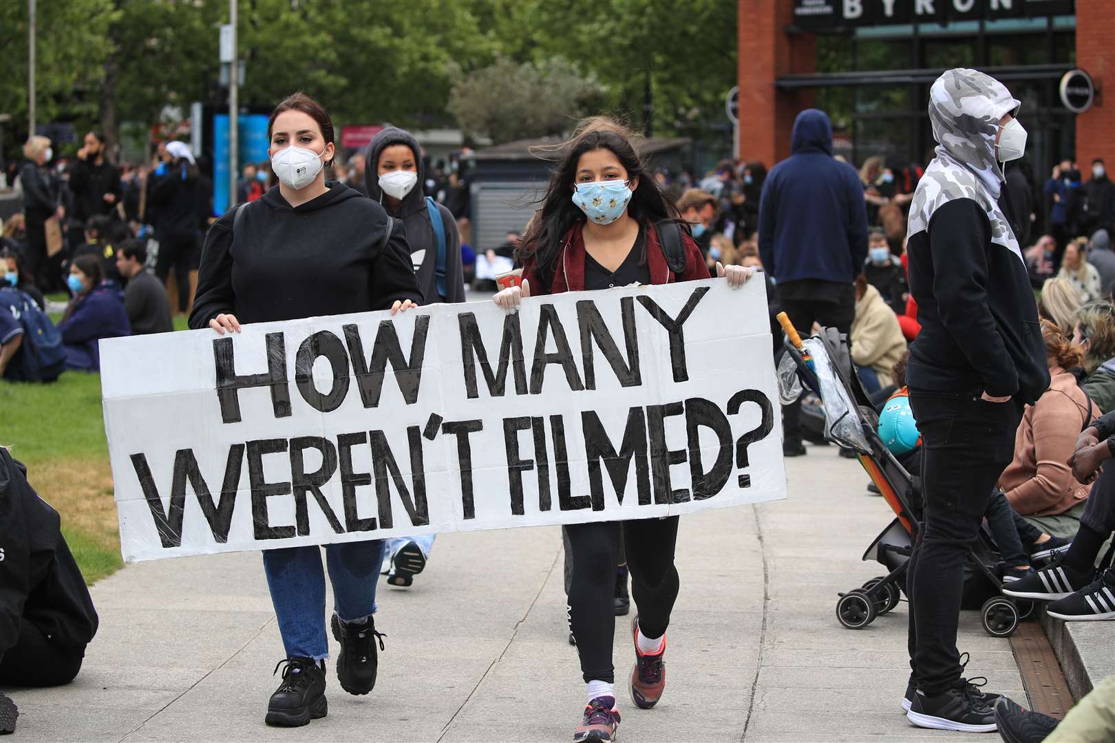 Protesters take part in a rally in Manchester’s Piccadilly Gardens (Danny Lawson/PA)