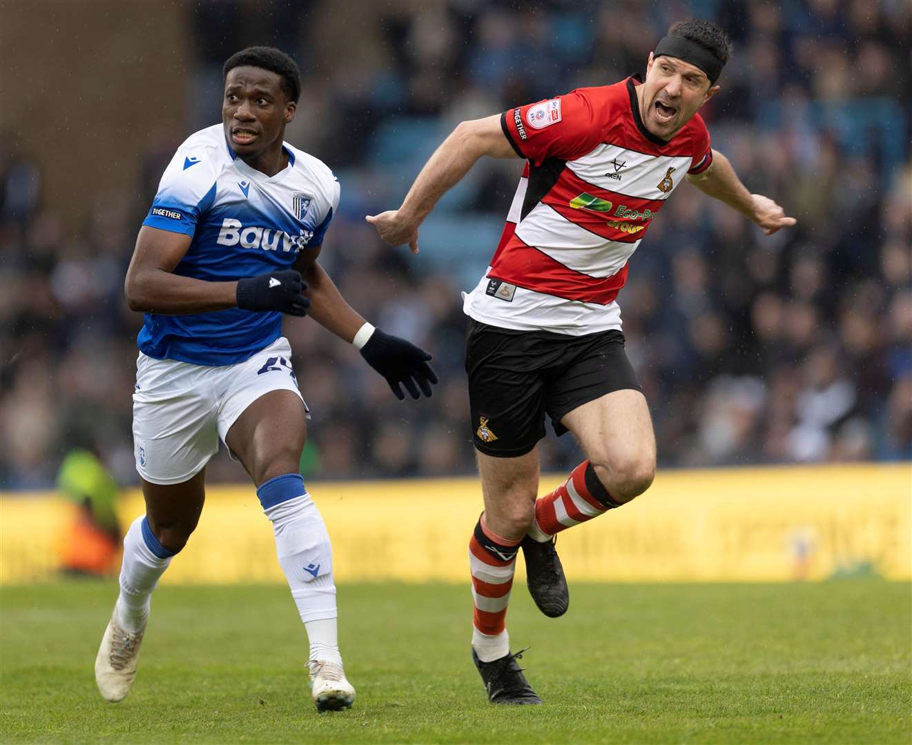 Former academy player of the year Joe Gbode gets stuck in for the first team against Doncaster Rovers in April. Picture: @Julian_KPI