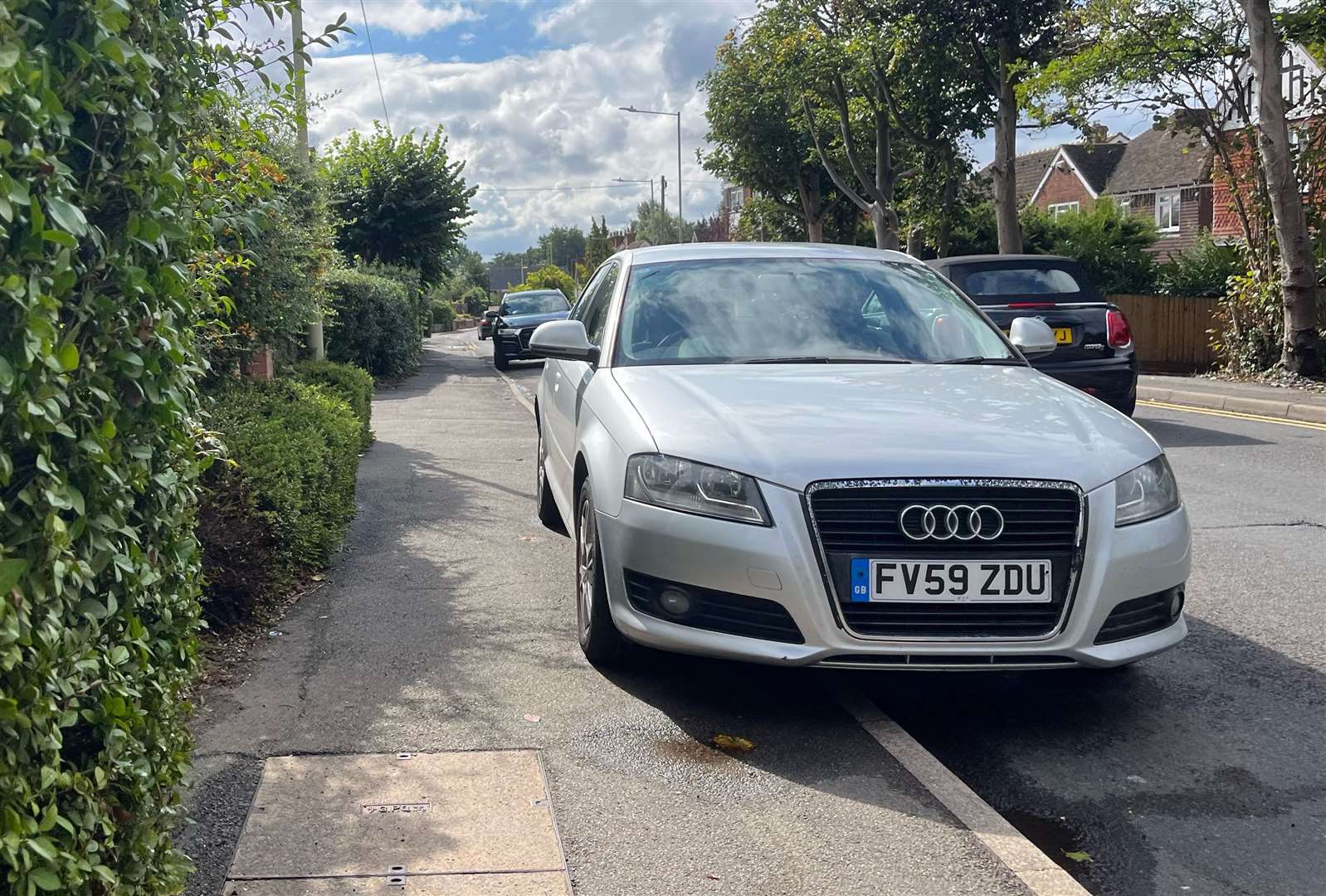 A number of cars have been left at the roadside in Faversham Road