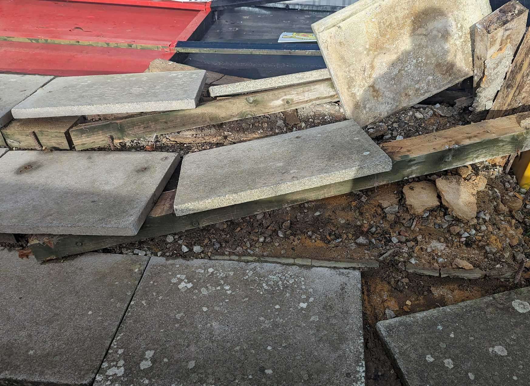 The concrete slabs holding Blakey's Shed together have been uplifted in the storm. Picture: Sittingbourne FC