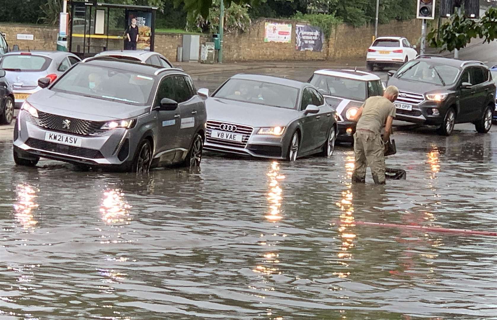 Flooding on the A20 at the Quarry Wood lights. Picture: Conrad Fry