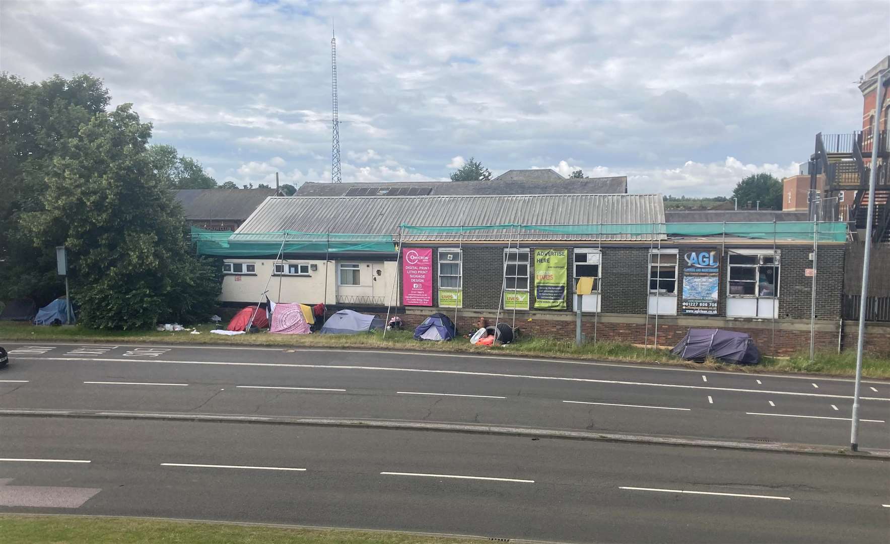 The encampment on the Canterbury ring road, outside Catching Lives and Club Chemistry