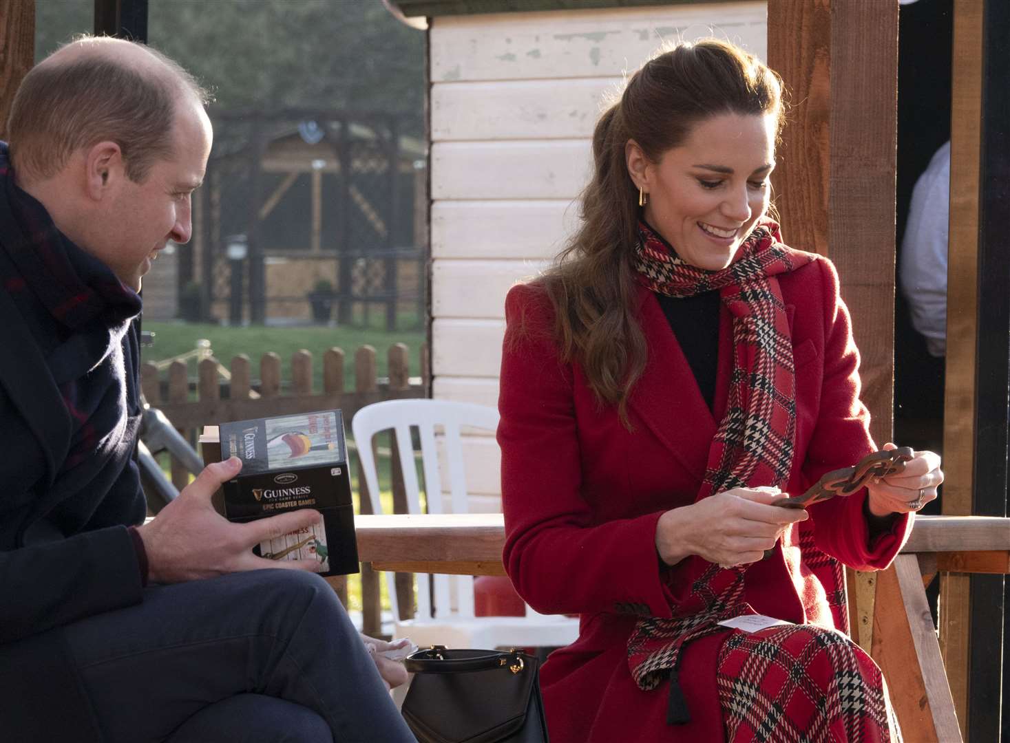 The Duke and Duchess of Cambridge open their Secret Santa gifts (Jonathan Buckmaster/Daily Express/PA)