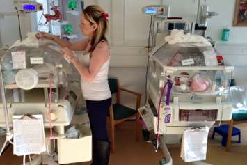 Carla Wilson at the hospital with her twins