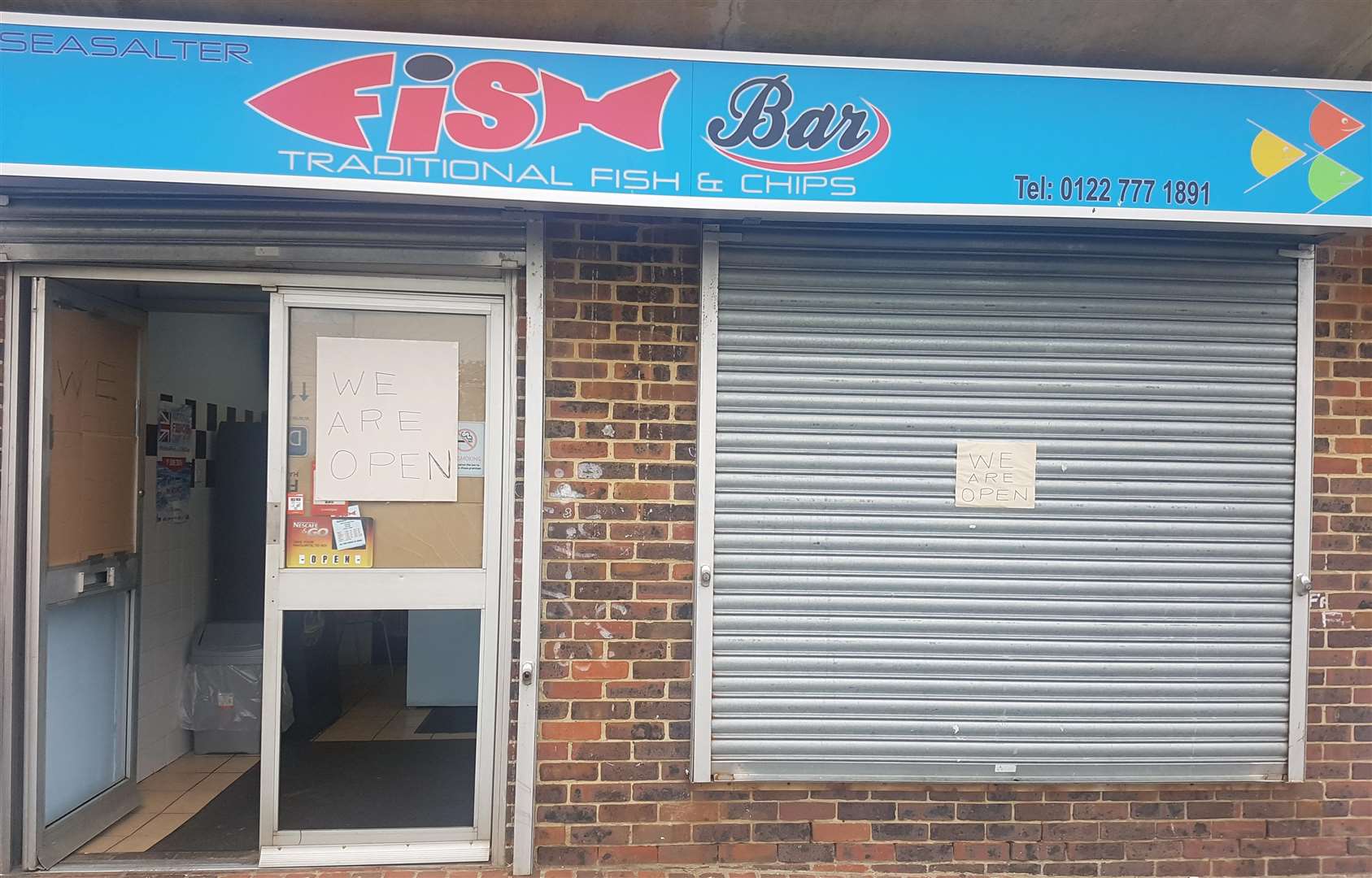 The shop front was smashed through (2282496)