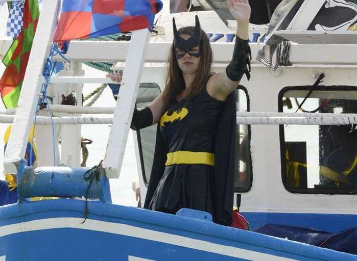 Catwoman waving to crowds at Folkestone's Trawler Race in 2018. Picture: Paul Amos