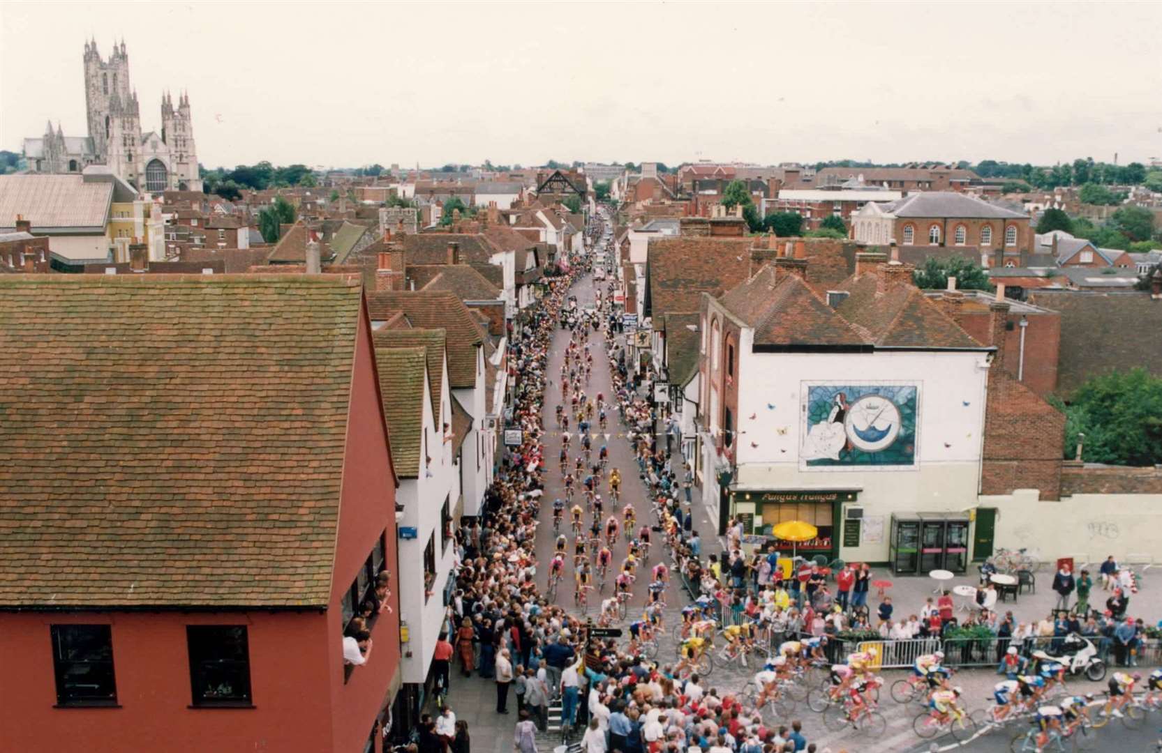 Riders speeding down St Peter’s Street in Canterbury during the Tour De France in 1994