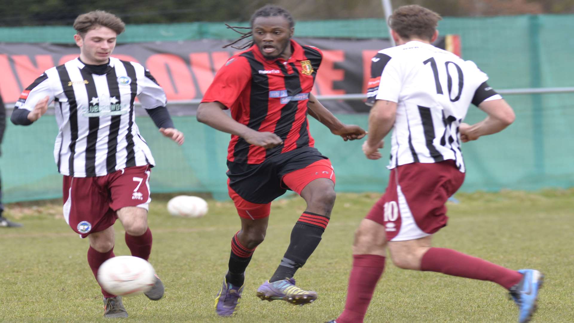 Sittingbourne, red, in action against Peacehaven last weekend. Picture: Ruth Cuerden