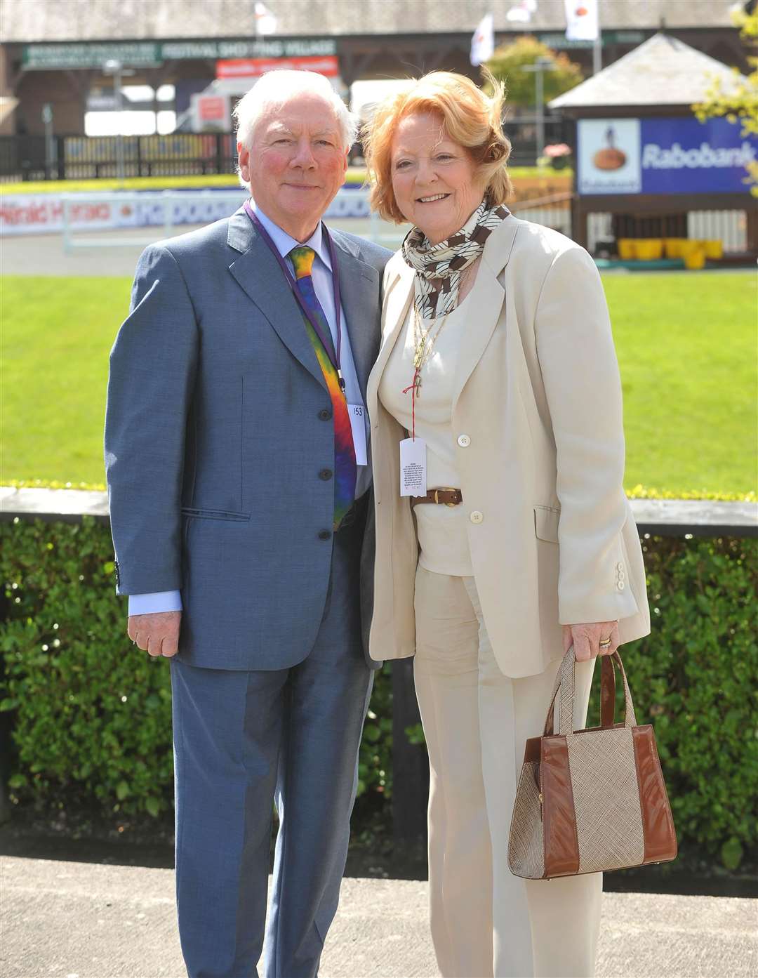 Gay Byrne and Kathleen Watkins on a visit to the Punchestown racing festival at Punchestown Racecourse (PA)