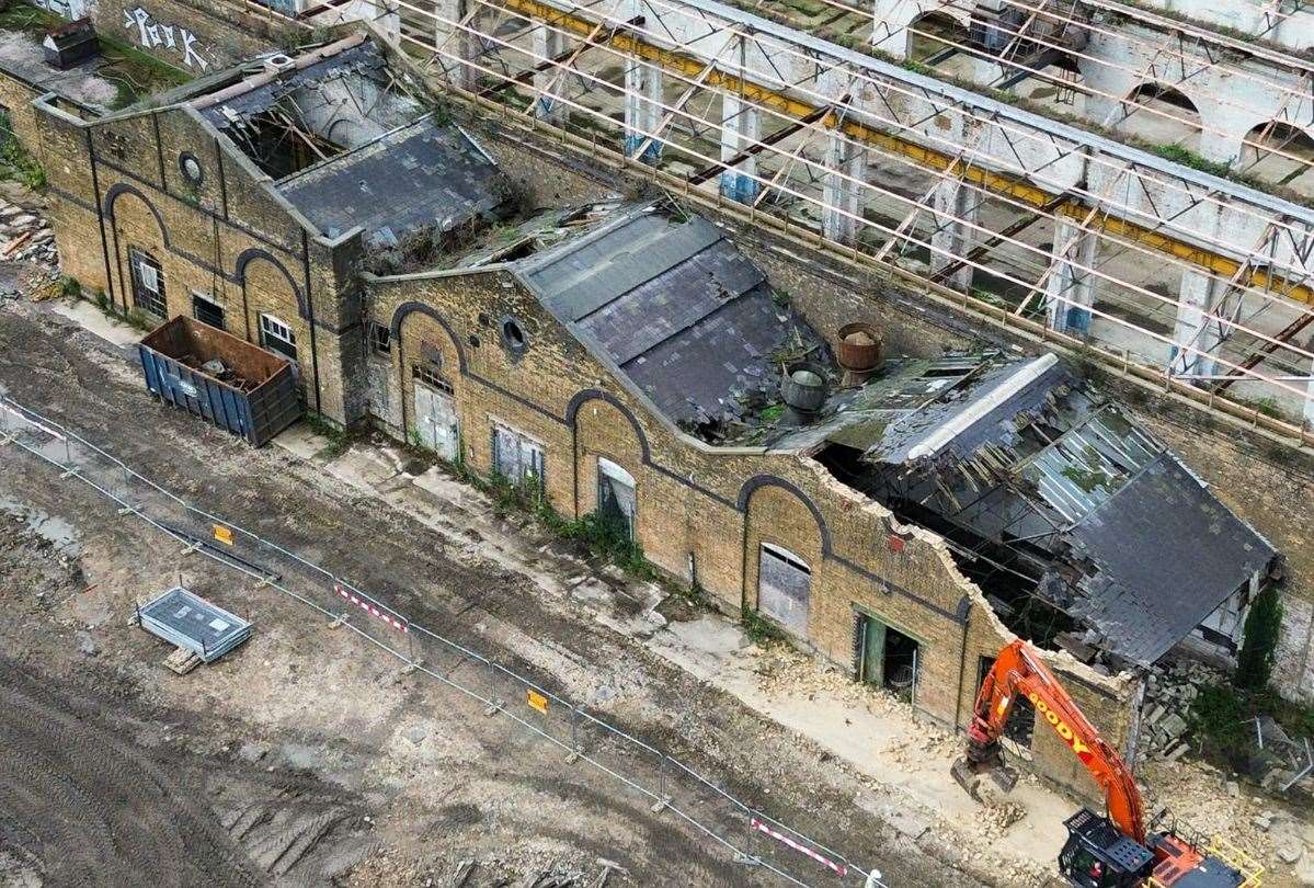 Demolition work is continuing at the site; lean-to buildings connected to the abandoned engine sheds were flattened earlier this month. Picture: Nicholas Cane