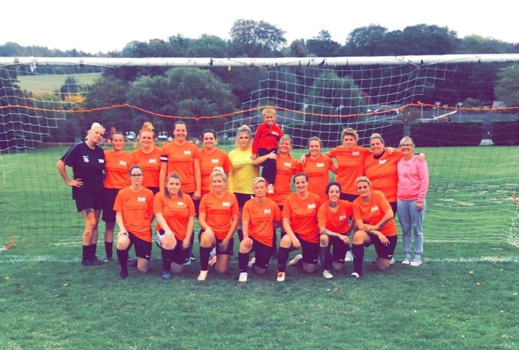 Sheppey Angels' manager Toni Golden on the left, in black, next to Lucy